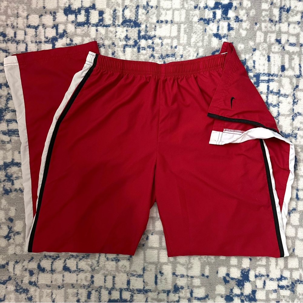 2000s y2k red Nike track pants with black embroidered swoosh